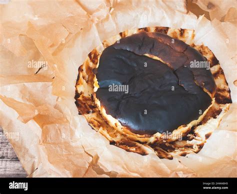 Basque burnt cheesecake with rich dark top. Spanish cake with burnt ...