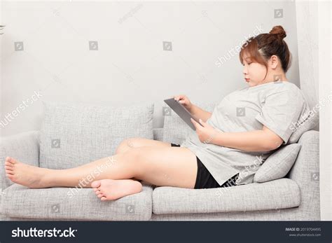 Asian Fat Girl Sitting On Sofa Stock Photo 2019704495 | Shutterstock