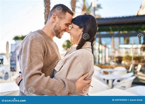 Man and Woman Couple Smiling Confident Hugging Each Other Standing at ...