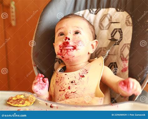 Baby Led Weaning - Curious Baby Eating Blueberries Stock Image - Image of childrens, mess: 229698939