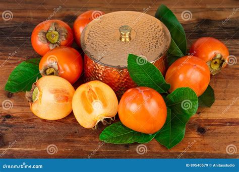 Persimmons Kaki Fruits Composition on Old Wood. Oriental East Still ...