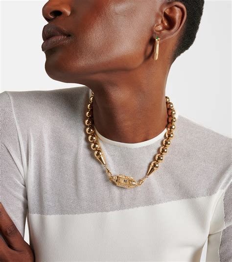 No Risk No Glory 18kt gold locket necklace with diamonds in gold - Marie Lichtenberg | Mytheresa