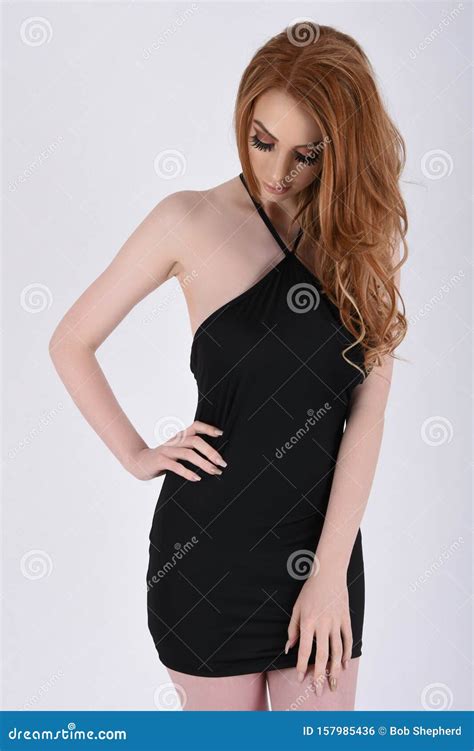 Sexy, Busty Redhead in a Short, Tight, Black, Party Dress Stock Photo - Image of alluring, dance ...