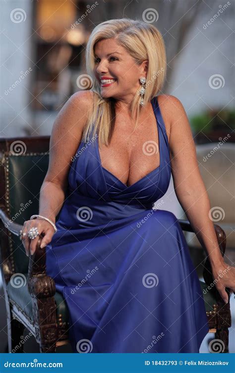 Attractive Middle Aged Woman Smiling Stock Image - Image: 18432793