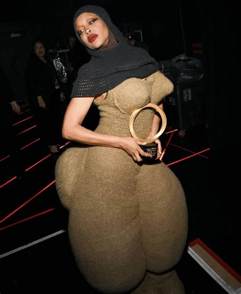 The Story Behind Erykah Badu’s Billboard Booty Suit - 1 Granary