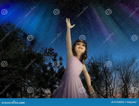 Young Girl Reaching for the Stars in Hope Stock Image - Image of people ...