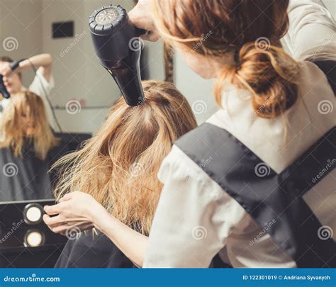 Beautician Blow Dry Woman`s Hair at Beauty Salon Stock Image - Image of ...