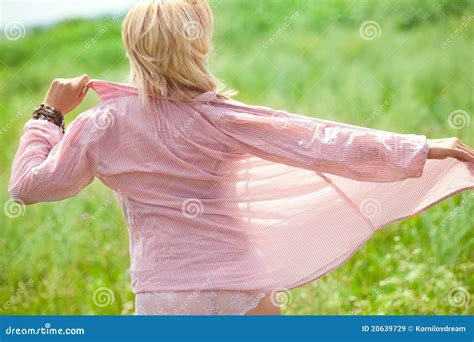 Beautiful Woman Undressing on Field Stock Image - Image of head, female ...