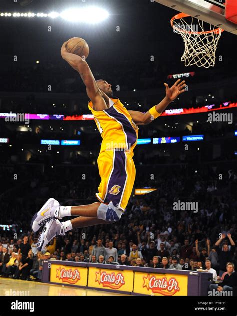 Los Angeles Lakers' Kobe Bryant dunks two of his 28 points during ...