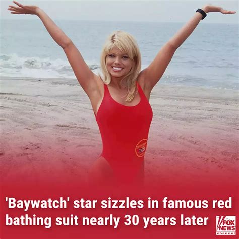 'Baywatch' star Donna D'Errico, 55, sizzles in famous red bathing suit ...
