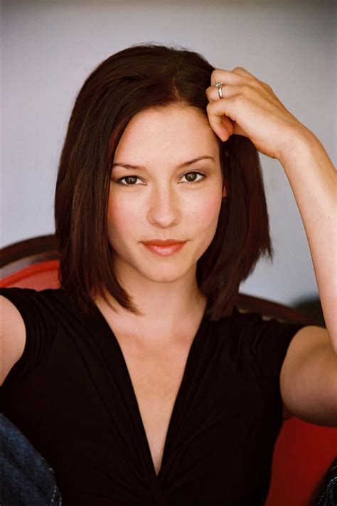 Download Caption: Chyler Leigh posing confidently during a photoshoot ...