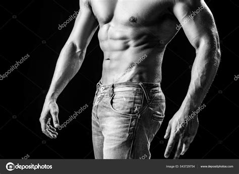 Sexy guy man on black. Handsome fitness young bodybuilder with naked ...