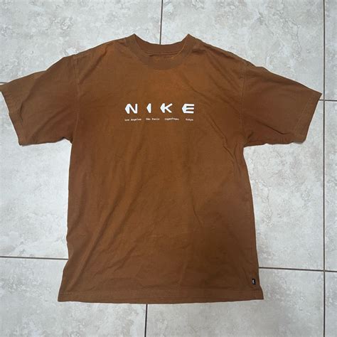 brown nike sb shirt worn twice size small but loose... - Depop