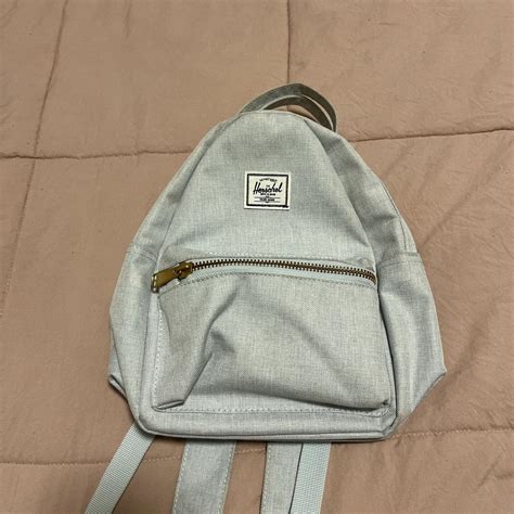 Small light blue Herschel mini backpack excellent... - Depop