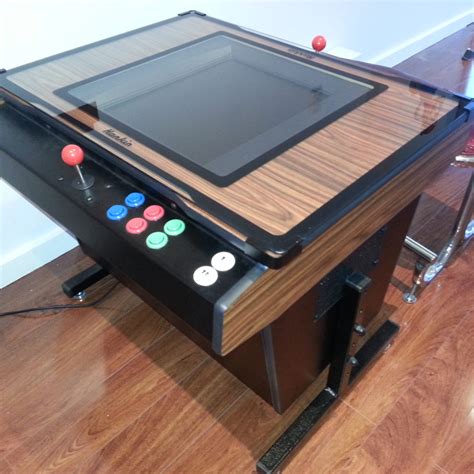 Glass Top Arcade Table at Felipe Heidt blog