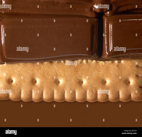 melting dark chocolate on crispy shortbread Stock Photo - Alamy