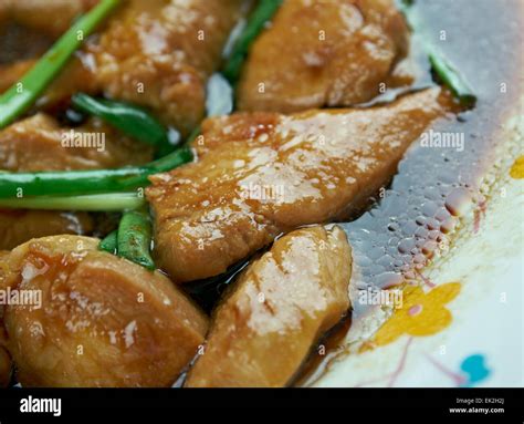 Mongolian Chicken - American style Chinese food stir fried. preparation ...