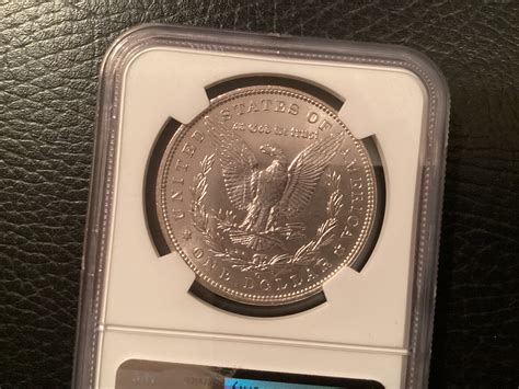 1900 o/cc pcgs vs ngc which would you keep? — Collectors Universe