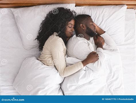 Romantic Black Couple Hugging while Sleeping in Bed Stock Photo - Image ...
