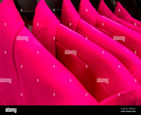 Women's Suit Jackets on Hangers in Retail Store Stock Photo - Alamy