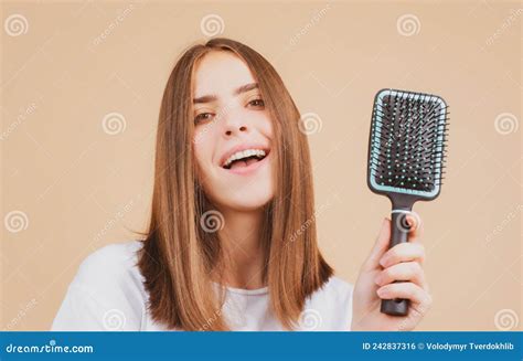 Brushing Hair. Portrait Young Woman Brushing Straight Natural Hair with ...