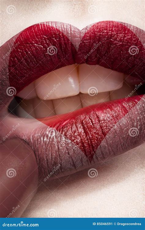 Applying Lipstick on Heart Shape Lips Stock Image - Image of model ...