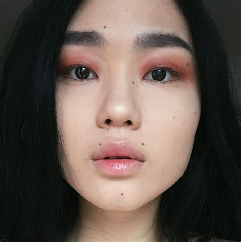 Kicki Yang Zhang 张旸 on Instagram: “uh oh so soft 🐞” | Moles on face ...