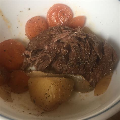 Tender Slow Cooker Chuck Roast with Roasted Potatoes and Carrots