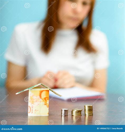Middle Age Woman with Model House from Israel Currencies New Israeli ...