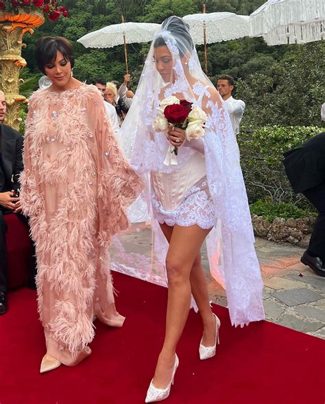 How Kourtney Kardashian really feels about fans slamming her Dolce & Gabbana wedding dress as ...