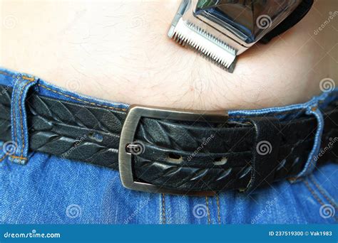 Men`s Haircut of Pubic Hair and Abdominal Hair with a Clipper. Stock ...