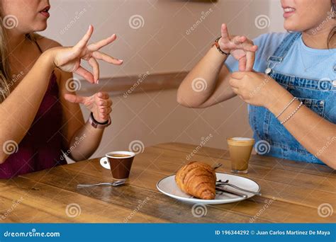 Detailed Drawing of Two Young Women Drinking Coffee and Speaking in ...