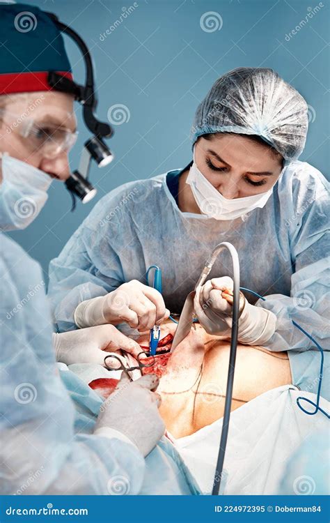 Doctors Perform Breast Surgery after Removal of a Cancerous Tumor ...