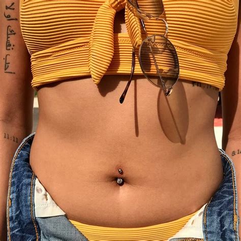 Rejecting Belly Piercing: Causes, Symptoms & Preventions - Psycho Tats