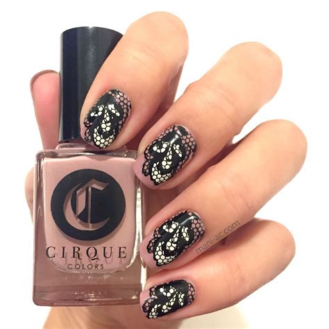 Reverse-stamped manicure using Cirque Colors' Jane on Jane St., Carpe ...