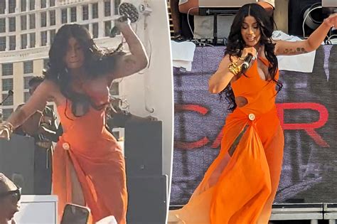 Cardi B nearly suffers a nip slip in racy photo from bed