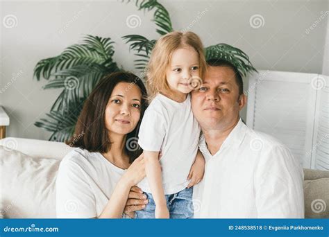 Happy Family of Three at Home. Stock Photo - Image of home, love: 248538518
