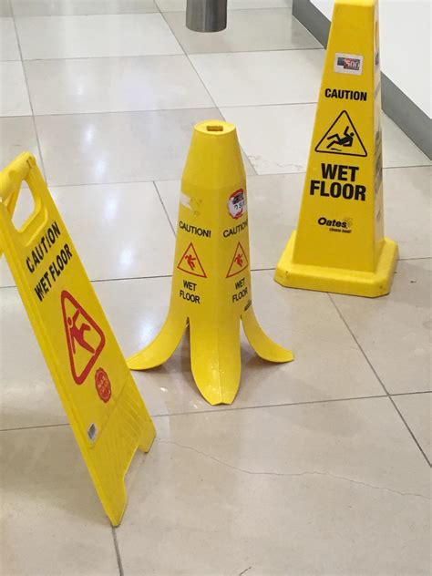 My office building uses wet floor signs shaped like banana peels. : r ...