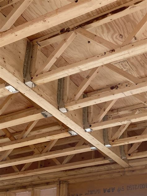 Three practical installations of engineered wood floor joist structures ...