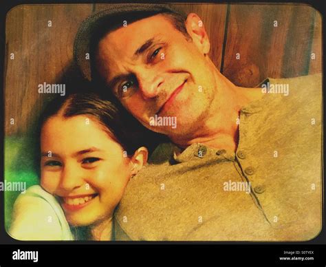 Father and daughter smiling portrait Stock Photo - Alamy