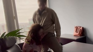 MILF boss fucked against her office window