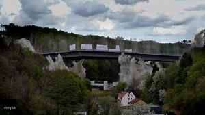 Boom, there it goes! Spectators were in awe watching 330 pounds of explosives destroy a massive bridge. | USA TODAY Video