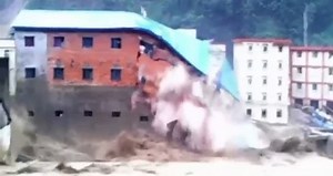 Dramatic rescue of a woman from a stream and building collapse in China