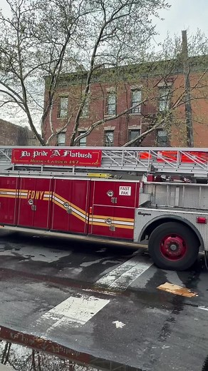 FDNY Ladder 147 Tiller Taking Up at Brooklyn Building Fire
