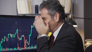 Profitable trader rejoices. The mature trader who follows the stock market rejoices. | Premium Stock Video Footage