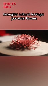 6.3K views · 41 reactions | Trending in China | Intangible cultural heritage: porcelain flowers #Porcelain flowers, a well-established ceramic decoration technique, have a unique artistic appeal. It's hard to imagine that these beautiful flowers are made of porcelain until you see them up close. A lump of porcelain clay is finely sculpted and tempered by fire, transforming into a stunning flower. Click the video to witness this fantastic skill in action. | WE ARE CHINA | Facebook