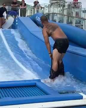Guy's Pants Come off Riding Surf Slide - 1022927