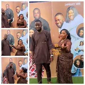 A newly wedded couple playfully portrays themselves as guests at their own celebration, standing beside their wedding banner while extending good wishes to the bride and groom in a lively and delightful scene. 🎥: Giftsnsurprises (TT) #weddingvibes #22injection #couplelife #nigerianweddings | 22injection