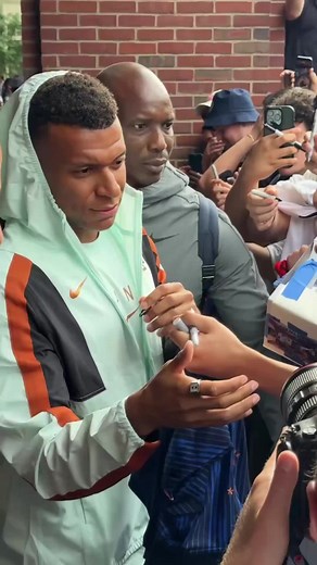 France arrive at their Boston hotel ahead of World Cup