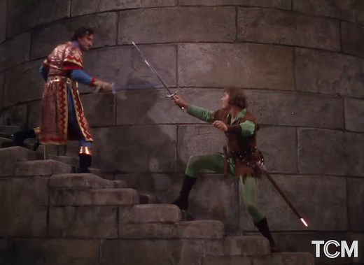 Swordmaster Fred Cavens taught Star of the Month Errol Flynn for CAPTAIN BLOOD ('35) and THE ADVENTURES OF ROBIN HOOD ('38). Cavens’ approach was to create a routine that was choreographed like a dance with counts and phrases. Learn more about Cavens and stuntwork in the new book from the TCM Library, Danger on the Silver Screen: https://bit.ly/3uV2gx8 | Turner Classic Movies: TCM